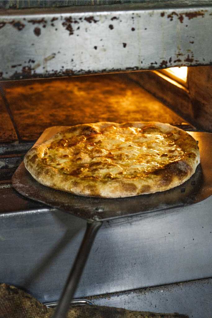 queso en pizza